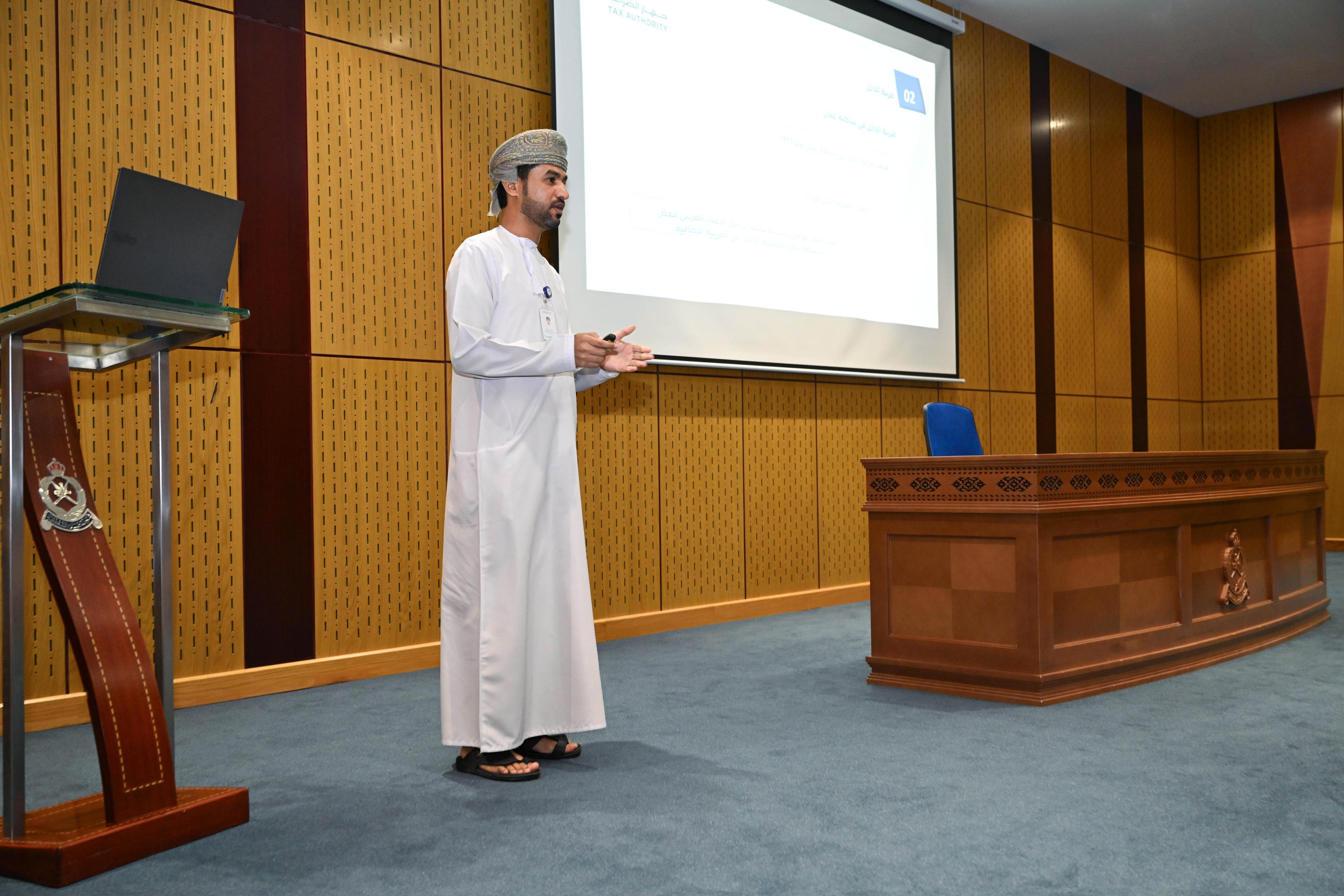 Organizing a tax seminar at the Academy for Police Sciences in Nizwa